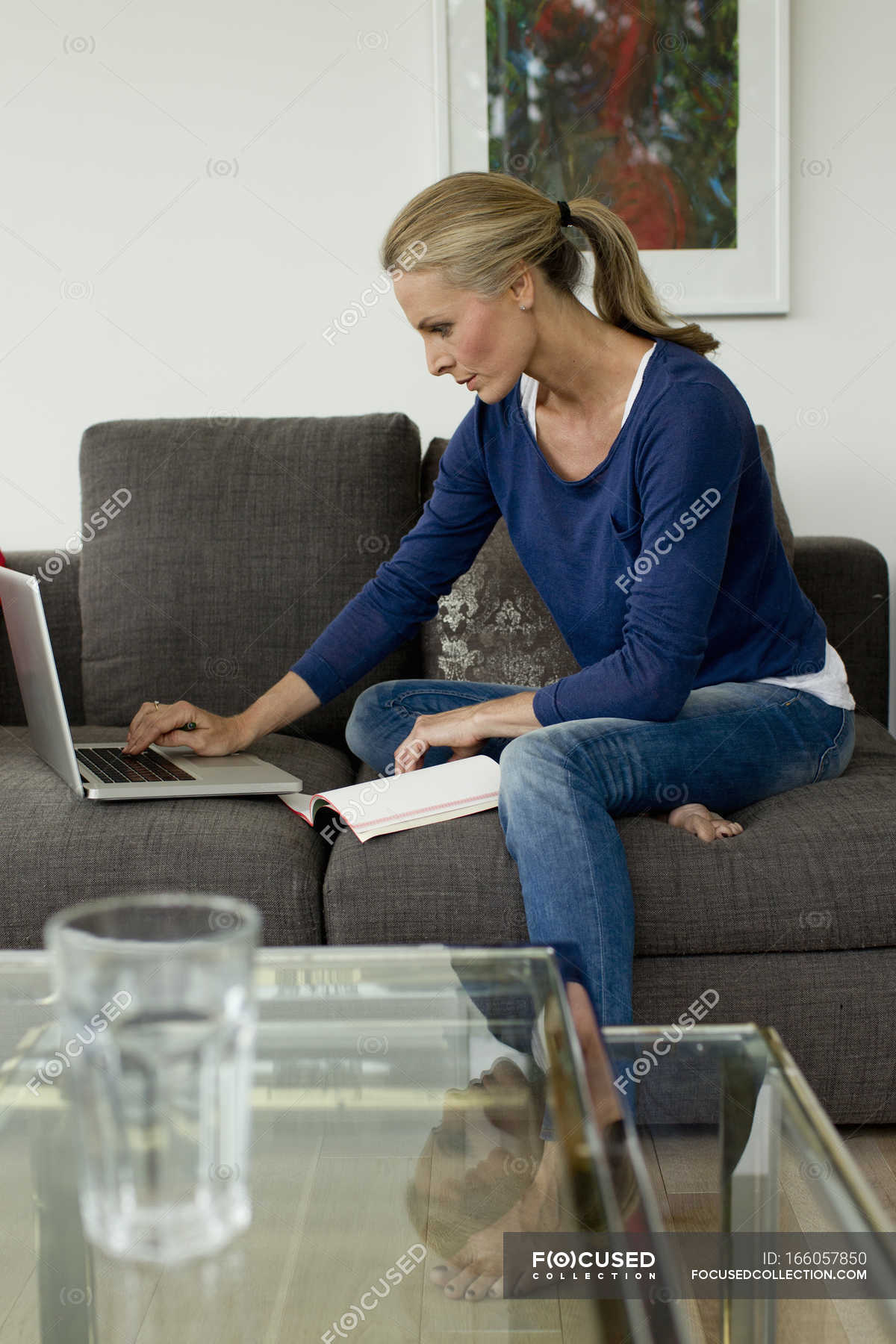 Mature Woman Working From Home On Laptop Technology Bavaria Stock