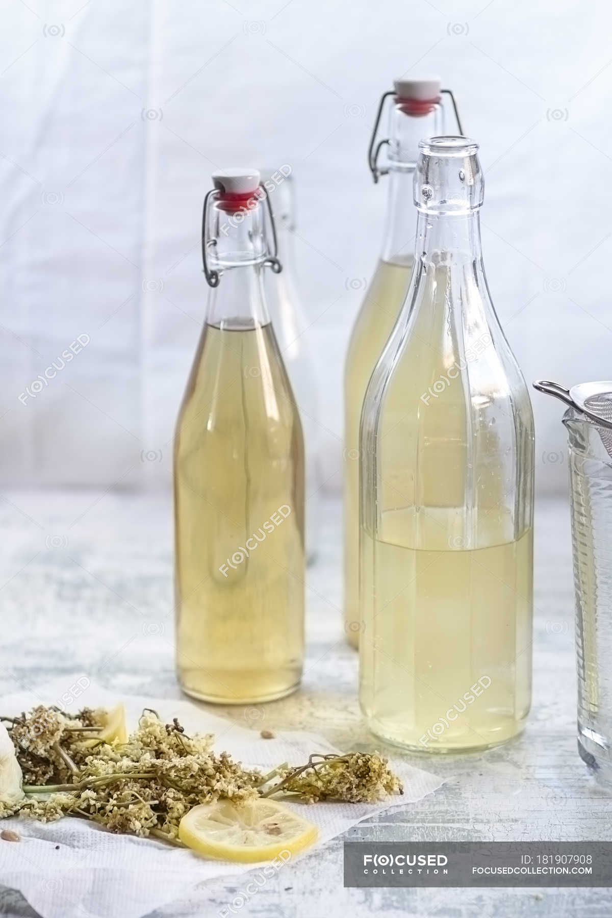 Bottles Of Home Made Elderflower Cordial Blossom Citrus Fruit