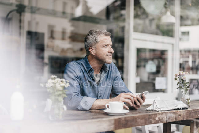 Mature Man Sitting In Cafe Food And Drink Industry Years