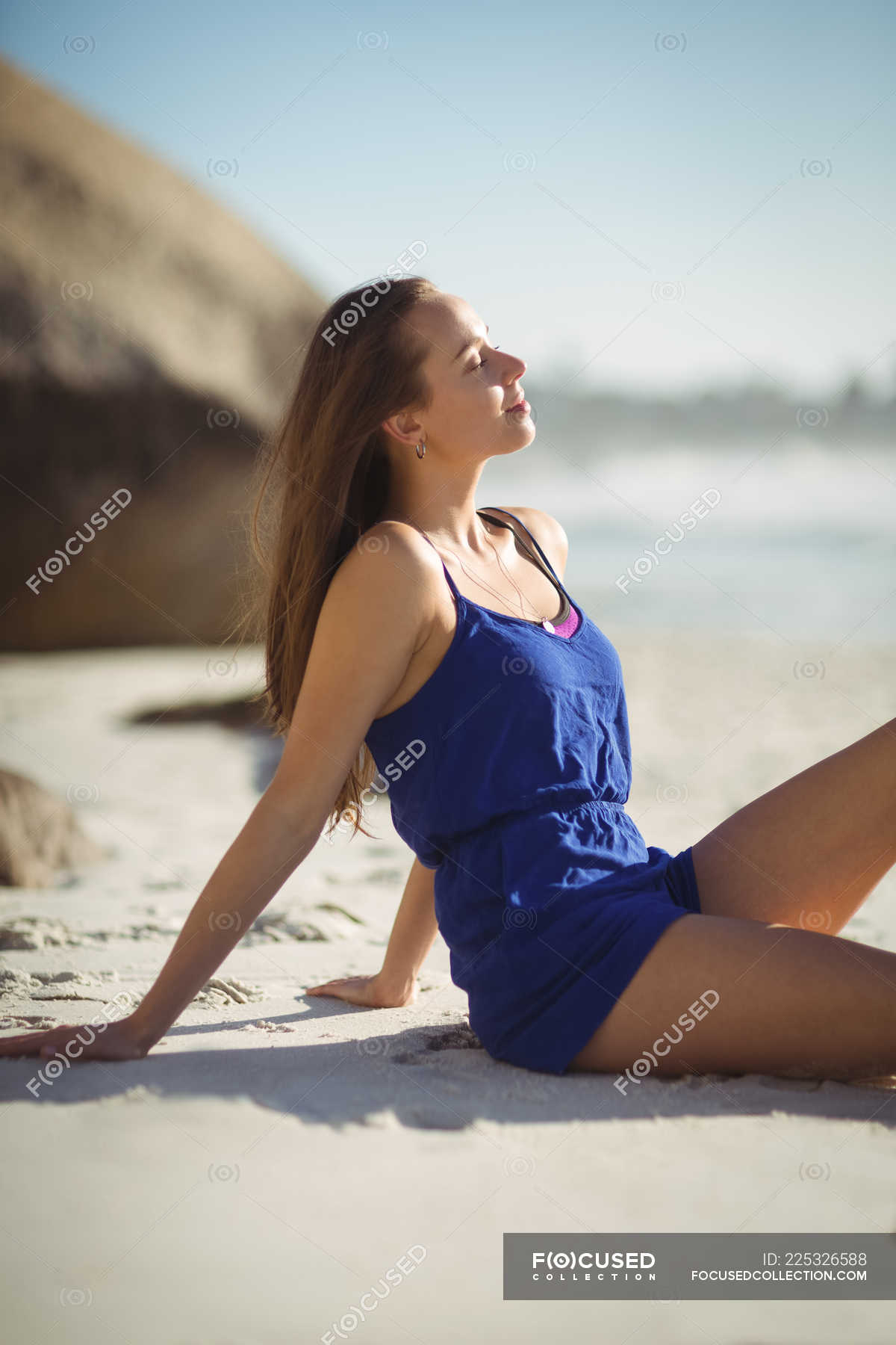 Beautiful Woman Relaxing On Beach On A Sunny Day Healthy Lifestyle