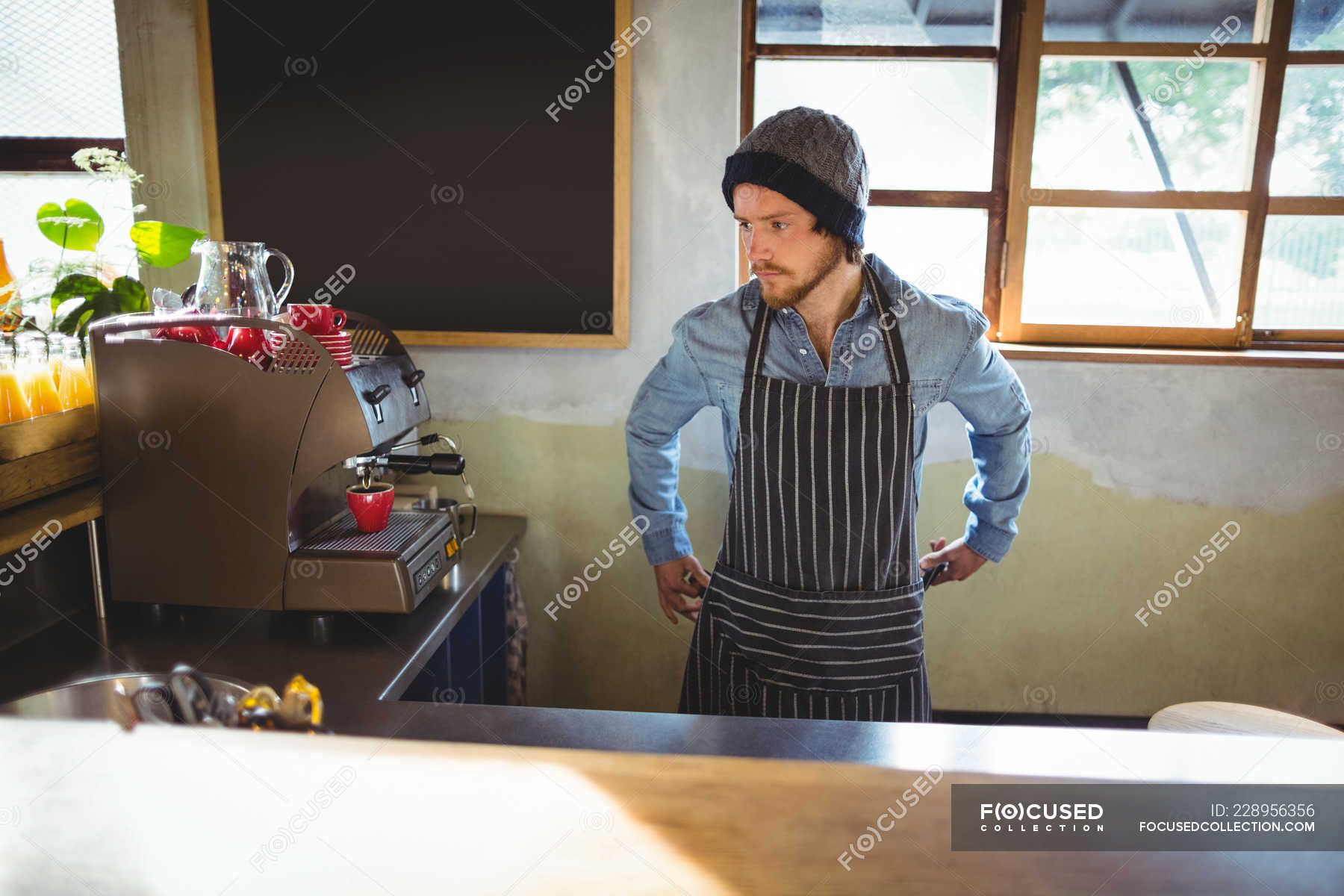 Waiter Tying His Apron In Cafe At Bicycle Shop Hospitality Preparing