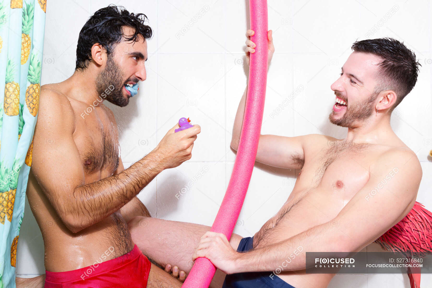 Side View Of Cheerful Diverse Bearded Homosexual Boyfriends With Naked