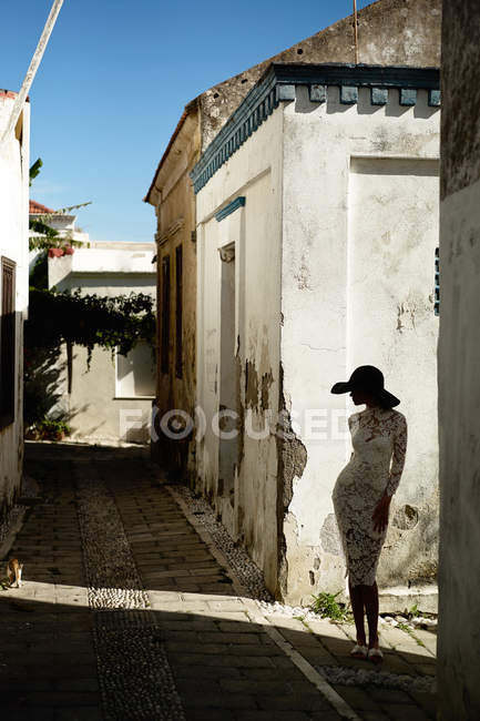 Elegant lady in an old European town — Stock Photo