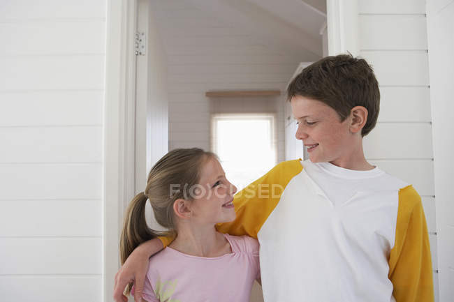 Brother and Sister hugging — Stock Photo