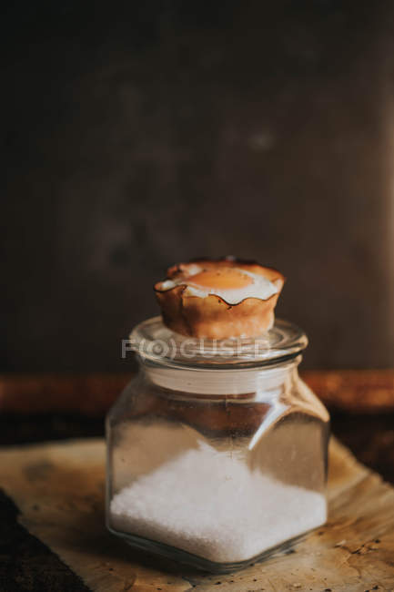 Baked egg basket on jar of sugar — Stock Photo