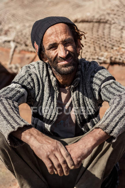 Unidentified fisherman in the port — Stock Photo