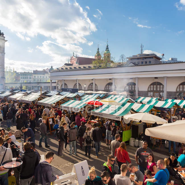 People enjoing outdoor street food festival in Ljubljana, Slovenia. — Stock Photo