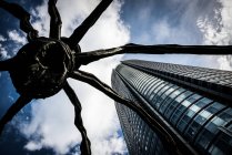 Bottom view of giant spider statue — Stock Photo
