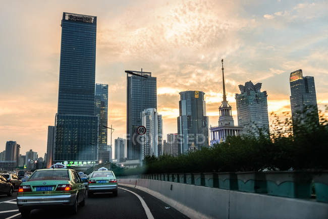 View of skyscapers and cars — Stock Photo