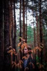 Young girl in forest — Stock Photo