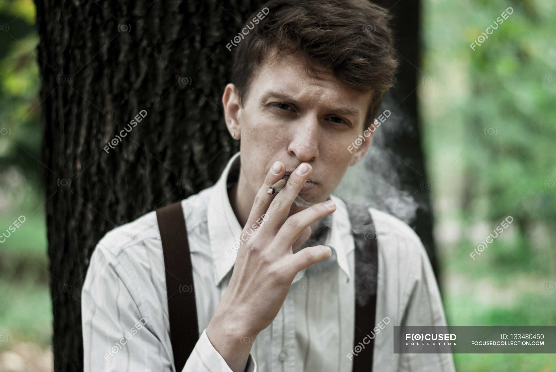 a guy with a ciggrate