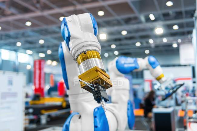 Robot arm in a factory — Stock Photo