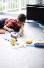 Boy playing with toys — Stock Photo