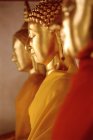 Buddha statues in a row — Stock Photo