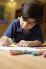 Little boy coloring — Stock Photo