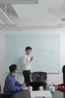 Man giving presentation — Stock Photo