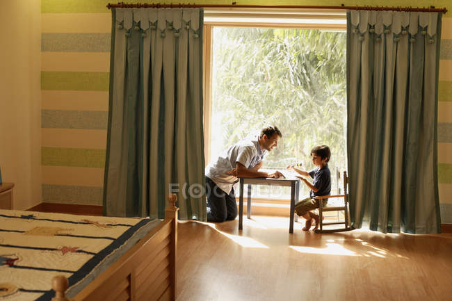 Father and son playing — Stock Photo