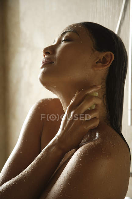 Woman taking shower — Stock Photo