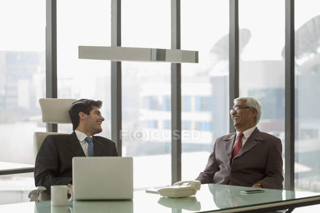 Businessmen during discussion at office — Stock Photo