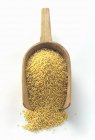 Millet in a Wooden Scoop — Stock Photo