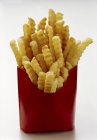 French fries potatoes in a red paper box — Stock Photo