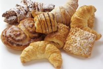 Croissants and sweet buns — Stock Photo