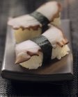 Two maki tako sushi — Stock Photo