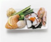 Assorted sashimi with squid and prawns — Stock Photo