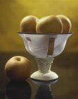 Nashi pears in fruit bowl — Stock Photo