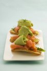 Canapes with avocado sorbet — Stock Photo