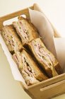 Ham sandwiches in  box — Stock Photo