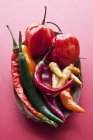 Various chilli peppers — Stock Photo