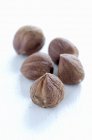 Five hazelnuts, macro — Stock Photo