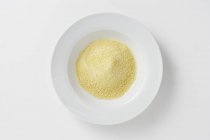 Closeup top view of a plate of bread crumbs — Stock Photo