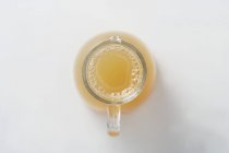 Apple juice in glass jug — Stock Photo