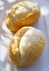 Fresh baked baguette rolls — Stock Photo