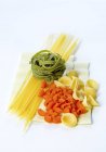 Various dried pastas on table — Stock Photo