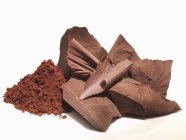 Primer plano de trozos de chocolate - foto de stock