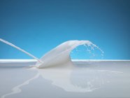 Éclaboussure de lait, gros plan — Photo de stock