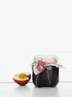 Jar of peach jam — Stock Photo
