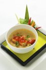 Closeup view of steamed egg with spicy Szechaun prawns, vegetables and herbs — Stock Photo