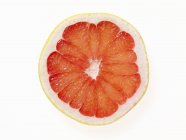 Половина рожевий грейпфрут — стокове фото