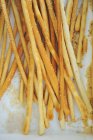 Closeup top view of salted bread sticks — Stock Photo