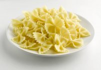 Plate of cooked farfalle — Stock Photo
