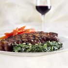 Grilled Steak with Spinach — Stock Photo