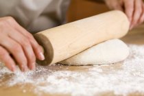 Woman Rolling Out Dough — Stock Photo