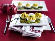 Devilled eggs on cucumber — Stock Photo