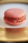 Macaroon on Gold  Plate — Stock Photo