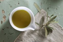 Bowl of olive oil — Stock Photo