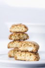 Closeup view of stacked Cantuccini on white plate — Stock Photo